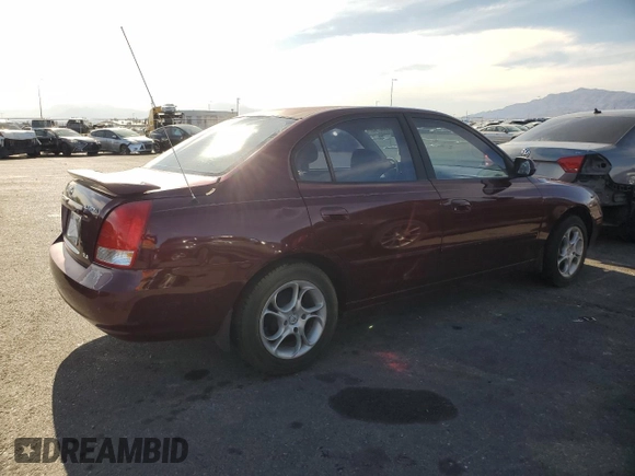 2001 Hyundai Elantra GLS z VIN KMHDN45D41U107399, wystawiony jako Copart lot #52658745 z przebiegiem 65 459 mil mil oraz Szkoda całkowita • Salvage title. Historia ofert i sprzedaży dostępna na DreamBid. Obrazek 3.