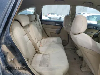 2009 Honda CR-V LX z VIN 5J6RE38309L015015, wystawiony jako Copart lot #56763035 z przebiegiem 211 946 mil mil oraz Szkoda całkowita • Salvage title. Historia ofert i sprzedaży dostępna na DreamBid. Obrazek 11.