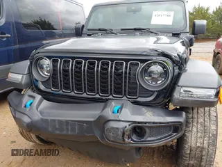 2024 Jeep Wrangler Willys z VIN 1C4RJXN60RW317717, wystawiony jako IAAI lot #42017788 z przebiegiem 10 096 mil mil oraz . Historia ofert i sprzedaży dostępna na DreamBid. Obrazek 6.