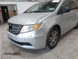 2012 Honda Odyssey EX z VIN 5FNRL5H47CB045705, wystawiony jako IAAI lot #42384430 z przebiegiem 157 598 mil mil oraz . Historia ofert i sprzedaży dostępna na DreamBid. Obrazek 18.