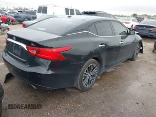 2016 Nissan Maxima S with VIN 1N4AA6AP9GC435386, listed as a IAAI auction lot 41697357 with 101,631 mi miles and . Bid and sale history available at DreamBid. Image 4.