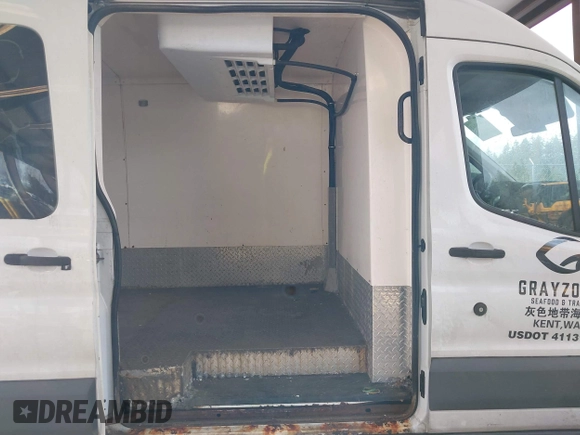 2016 Ford Transit Cargo with VIN 1FTYR2CM7GKA43378, listed as a IAAI auction lot 41598342 with 227,575 mi miles and . Bid and sale history available at DreamBid. Image 8.