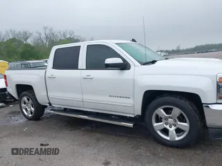 2016 Chevrolet Silverado 1500 LT with VIN 3GCPCREC0GG309728, listed as a IAAI auction lot 41911166 with 222,045 mi miles and . Bid and sale history available at DreamBid. Image 13.