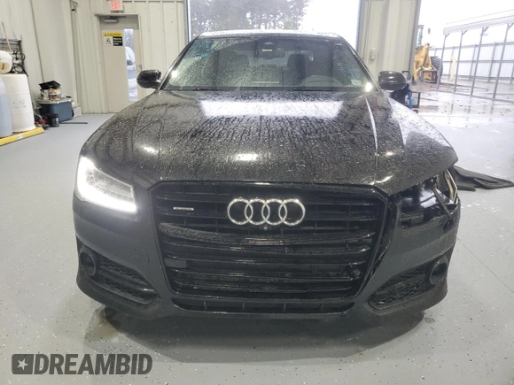 2017 Audi A8 Sport z VIN WAU43AFD4HN020515, wystawiony jako Copart lot #44953055 z przebiegiem 115 422 mil mil oraz Szkody całkowita. Historia ofert i sprzedaży dostępna na DreamBid. Obrazek 5.