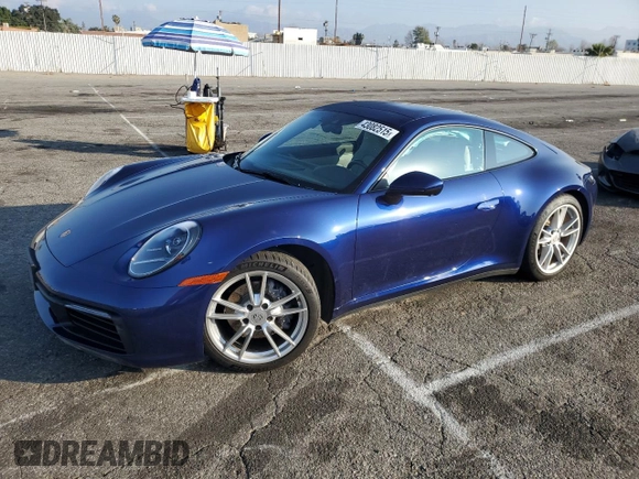 2022 Porsche 911 Carrera with VIN WP0AA2A99NS205256, listed as a Copart auction lot 43082515 with 21,682 mi miles and Salvage Title. Bid and sale history available at carsss.com. Image 1.