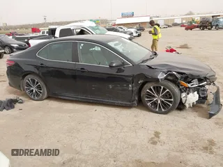 2019 Toyota Camry LE z VIN 4T1B11HK6KU805252, wystawiony jako IAAI lot #41787833 z przebiegiem 85 196 mil mil oraz . Historia ofert i sprzedaży dostępna na DreamBid. Obrazek 14.