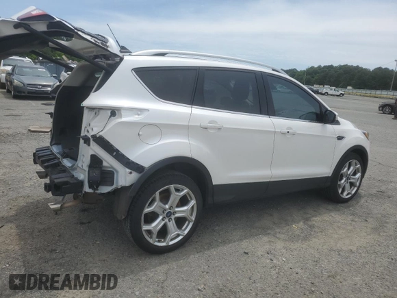 2019 Ford Escape Titanium with VIN 1FMCU0J94KUC02894, listed as a Copart auction lot 55352225 with 67,926 mi miles and Salvage title. Bid and sale history available at DreamBid. Image 3.