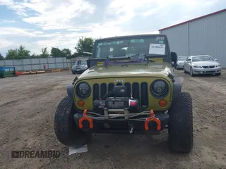 2007 Jeep Wrangler Unlimited X with VIN 1J4GA39177L164566, listed as a IAAI auction lot 42588655 with 50,915 mi miles and . Bid and sale history available at DreamBid. Image 12.