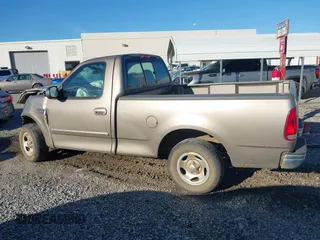 2002 Ford F-150 XL with VIN 1FTRF17W02NB01695, listed as a IAAI auction lot 41230523 with 398,649 mi miles. Bid and sale history available at carsss.com. Image 14.