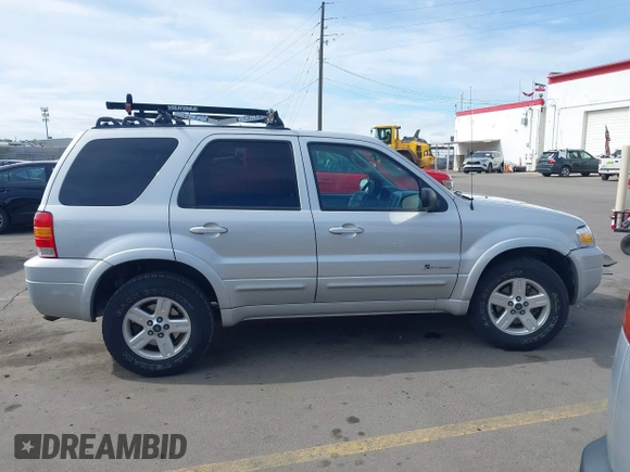 2006 Ford Escape Hybrid with VIN 1FMYU96H76KA14124, listed as a IAAI auction lot 42063449 with 53,055 mi miles and . Bid and sale history available at DreamBid. Image 13.