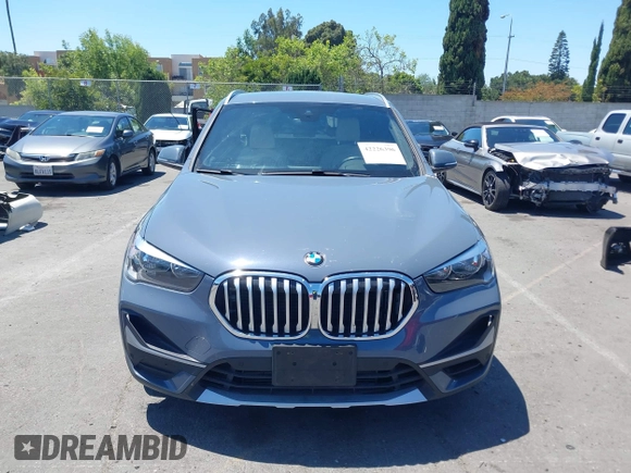 2021 BMW X1 sDrive28i z VIN WBXJG7C02M5T37169, wystawiony jako IAAI lot #42226396 z przebiegiem 48 603 mil mil oraz . Historia ofert i sprzedaży dostępna na DreamBid. Obrazek 13.