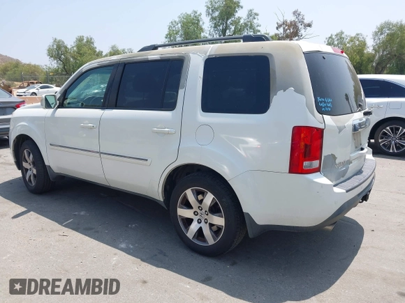 2013 Honda Pilot Touring with VIN 5FNYF3H93DB017954, listed as a IAAI auction lot 42185556 with 174,929 mi miles and . Bid and sale history available at carsss.com. Image 3.