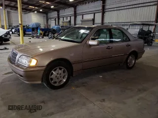 2000 Mercedes-Benz C 230/260/280/320 z VIN WDBHA29G9YA806709, wystawiony jako Copart lot #64520855 z przebiegiem 78 480 mil mil oraz Czysty tytuł • Clean title. Historia ofert i sprzedaży dostępna na DreamBid. Obrazek 1.