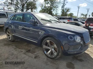 2020 Bentley Bentayga V8 z VIN SJAAM2ZV5LC027993, wystawiony jako Copart lot #75061544 z przebiegiem Nie podano mil oraz Nie do naprawy • Non repairable. Historia ofert i sprzedaży dostępna na DreamBid. Obrazek 4.