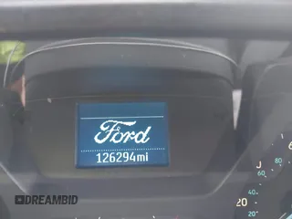 2018 Ford Transit with VIN 1FTYE1YM9JKA11568, listed as a IAAI auction lot 40266413 with 126,294 mi miles and . Bid and sale history available at DreamBid. Image 15.