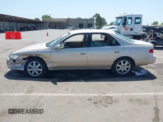 2001 Toyota Camry CE with VIN JT2BG22K910605420, listed as a IAAI auction lot 42109747 with 89,426 mi miles and . Bid and sale history available at DreamBid. Image 14.