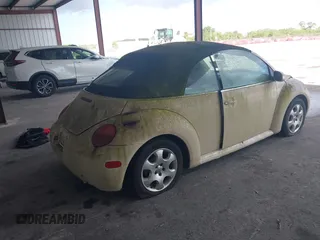 2003 Volkswagen Beetle GLS z VIN 3VWCK21Y33M309841, wystawiony jako IAAI lot #41883298 z przebiegiem 169 430 mil mil oraz . Historia ofert i sprzedaży dostępna na DreamBid. Obrazek 4.