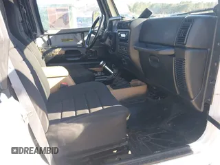 1997 Jeep Wrangler Sport with VIN 1J4FY19S7VP483735, listed as a IAAI auction lot 41469983 with 150,542 mi miles. Bid and sale history available at carsss.com. Image 5.
