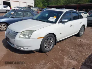 2008 Mercury Sable Premier z VIN 1MEHM42WX8G600980, wystawiony jako IAAI lot #42188836 z przebiegiem Nie podano mil oraz . Historia ofert i sprzedaży dostępna na DreamBid. Obrazek 2.