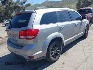 2017 Dodge Journey SXT z VIN 3C4PDCBG0HT530742, wystawiony jako IAAI lot #41997800 z przebiegiem 189 186 mil mil oraz . Historia ofert i sprzedaży dostępna na DreamBid. Obrazek 4.