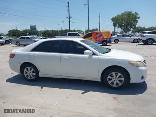 2011 Toyota Camry LE with VIN 4T1BK3EK2BU614537, listed as a IAAI auction lot 42124494 with 111,718 mi miles. Bid and sale history available at carsss.com. Image 13.