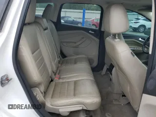 2013 Ford Escape SEL z VIN 1FMCU9HX4DUB05173, wystawiony jako Copart lot #57918125 z przebiegiem 197 195 mil mil oraz Szkoda całkowita • Salvage title. Historia ofert i sprzedaży dostępna na DreamBid. Obrazek 11.
