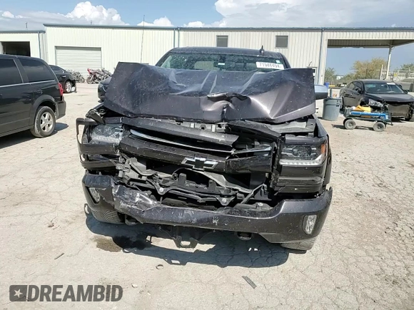 2016 Chevrolet Silverado 1500 LTZ with VIN 3GCUKSEJ3GG191945, listed as a Copart auction lot 71948494 with 143,055 mi miles and Salvage Title. Bid and sale history available at DreamBid. Image 11.