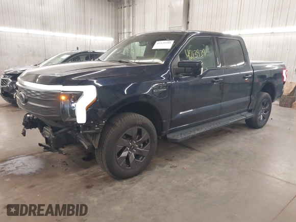 2023 Ford F-150 Lightning Pro with VIN 1FTVW1EL4PWG22900, listed as a IAAI auction lot 42139391 with 6,569 mi miles and . Bid and sale history available at DreamBid. Image 20.