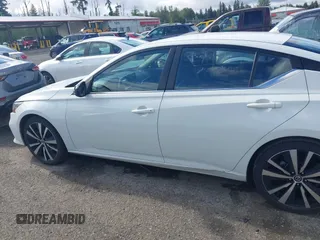 2022 Nissan Altima SR z VIN 1N4BL4CVXNN314267, wystawiony jako IAAI lot #42311934 z przebiegiem 56 536 mil mil oraz . Historia ofert i sprzedaży dostępna na DreamBid. Obrazek 14.
