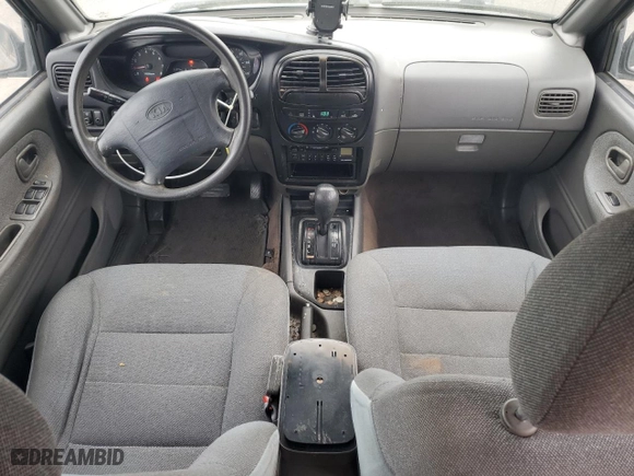 2001 Kia Sportage with VIN KNDJB723615696057, listed as a Copart auction lot 53584345 with 107,965 mi miles and Clean Title. Bid and sale history available at carsss.com. Image 8.