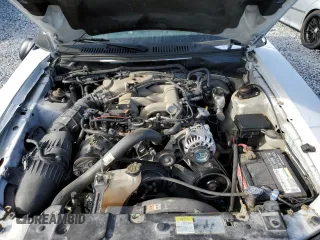 2002 Ford Mustang Deluxe with VIN 1FAFP44492F121223, listed as a Copart auction lot 62474065 with 128,984 mi miles and Salvage title. Bid and sale history available at DreamBid. Image 11.