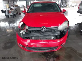 2011 Volkswagen Golf TDI with VIN WVWNM7AJ1BW165047, listed as a IAAI auction lot 41706792 with 197,674 mi miles. Bid and sale history available at carsss.com. Image 6.