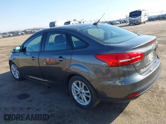 2016 Ford Focus SE with VIN 1FADP3F21GL212718, listed as a IAAI auction lot 41785985 with 101,198 mi miles. Bid and sale history available at carsss.com. Image 3.