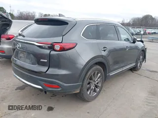 2016 Mazda CX-9 Grand Touring with VIN JM3TCADY4G0111310, listed as a IAAI auction lot 41532851 with 178,907 mi miles and . Bid and sale history available at DreamBid. Image 4.