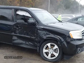2014 Honda Pilot EX-L with VIN 5FNYF3H50EB024598, listed as a IAAI auction lot 40864689 with 159,078 mi miles and . Bid and sale history available at DreamBid. Image 6.