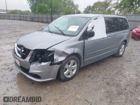 2013 Dodge Grand Caravan SE with VIN 2C4RDGBG2DR773577, listed as a IAAI auction lot 41823951 with 226,498 mi miles and . Bid and sale history available at DreamBid. Image 2.