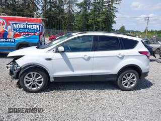 2018 Ford Escape SE z VIN 1FMCU9GD6JUB45046, wystawiony jako IAAI lot #42314262 z przebiegiem 107 962 mil mil oraz . Historia ofert i sprzedaży dostępna na DreamBid. Obrazek 15.
