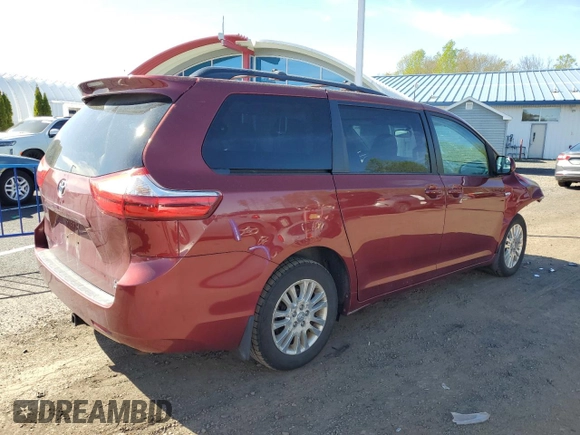 2016 Toyota Sienna LE with VIN 5TDJK3DC5GS132571, listed as a Copart auction lot 55155505 with 143,294 mi miles and Salvage Title. Bid and sale history available at carsss.com. Image 3.