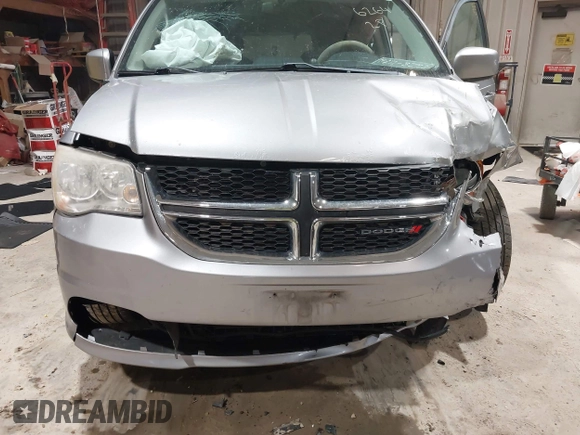 2014 Dodge Grand Caravan SXT z VIN 2C4RDGCGXER263963, wystawiony jako IAAI lot #41956264 z przebiegiem 138 815 mil mil oraz . Historia ofert i sprzedaży dostępna na DreamBid. Obrazek 6.