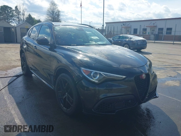 2020 Alfa Romeo Stelvio Ti z VIN ZASPAKBN7L7C92393, wystawiony jako IAAI lot #41824452 z przebiegiem 53 616 mil mil oraz . Historia ofert i sprzedaży dostępna na DreamBid. Obrazek 1.
