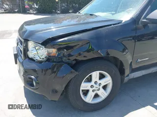 2009 Ford Escape Hybrid with VIN 1FMCU59369KB78293, listed as a IAAI auction lot 42478254 with 145,158 mi miles and . Bid and sale history available at DreamBid. Image 6.