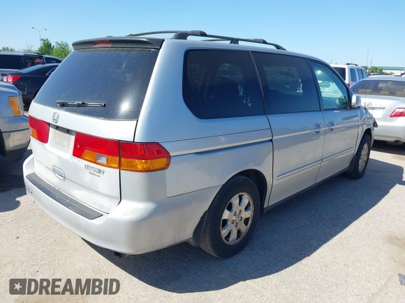 2002 Honda Odyssey EX-L z VIN 5FNRL18062B011890, wystawiony jako IAAI lot #41972294 z przebiegiem 245 889 mil mil oraz . Historia ofert i sprzedaży dostępna na DreamBid. Obrazek 4.