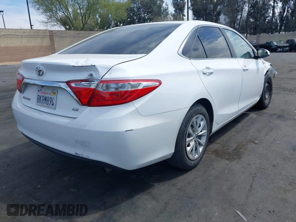2015 Toyota Camry XLE with VIN 4T1BF1FK3FU114299, listed as a IAAI auction lot 42024946 with 152,972 mi miles. Bid and sale history available at carsss.com. Image 4.