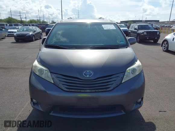 2014 Toyota Sienna XLE with VIN 5TDYK3DC2ES438980, listed as a IAAI auction lot 42067750 with 143,728 mi miles and . Bid and sale history available at DreamBid. Image 12.