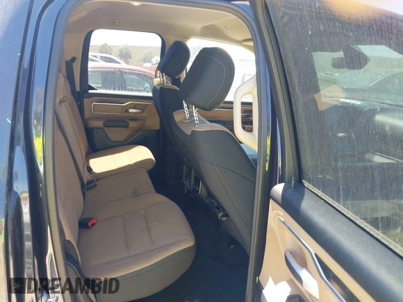 2021 Ram 1500 Lone Star z VIN 1C6RREBT0MN630263, wystawiony jako IAAI lot #41887871 z przebiegiem 52 386 mil mil oraz . Historia ofert i sprzedaży dostępna na DreamBid. Obrazek 8.