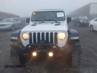 2022 Jeep Gladiator Rubicon z VIN 1C6JJTBG3NL111054, wystawiony jako IAAI lot #40793144 z przebiegiem 40 115 mil mil oraz . Historia ofert i sprzedaży dostępna na DreamBid. Obrazek 13.
