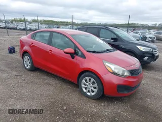 2012 Kia Rio LX with VIN KNADM4A30C6094000, listed as a IAAI auction lot 42059778 with 127,957 mi miles. Bid and sale history available at carsss.com. Image 1.