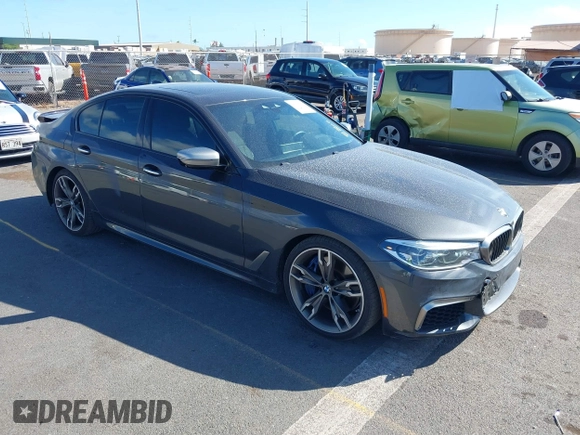 2018 BMW 5 Series M550i xDrive with VIN WBAJB9C51JB049513, listed as a IAAI auction lot 41146990 with 51,218 mi miles. Bid and sale history available at carsss.com. Image 1.