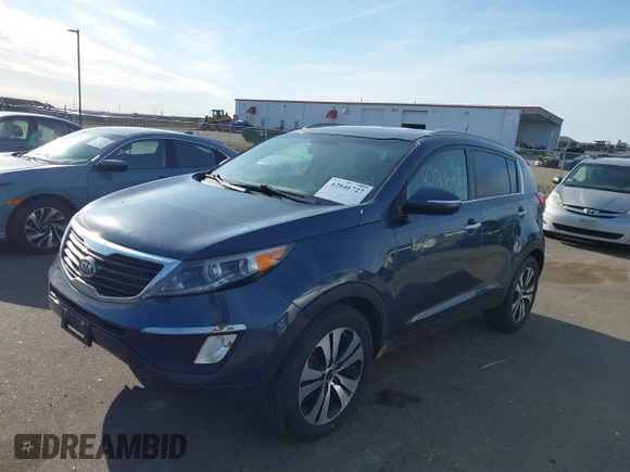 2012 Kia Sportage EX with VIN KNDPCCA22C7325011, listed as a IAAI auction lot 42046727 with 131,475 mi miles and . Bid and sale history available at DreamBid. Image 2.