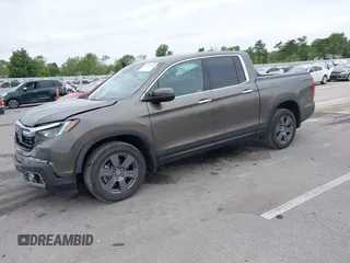 2020 Honda Ridgeline RTL-E with VIN 5FPYK3F78LB001882, listed as a IAAI auction lot 42352980 with 63,278 mi miles and . Bid and sale history available at DreamBid. Image 18.